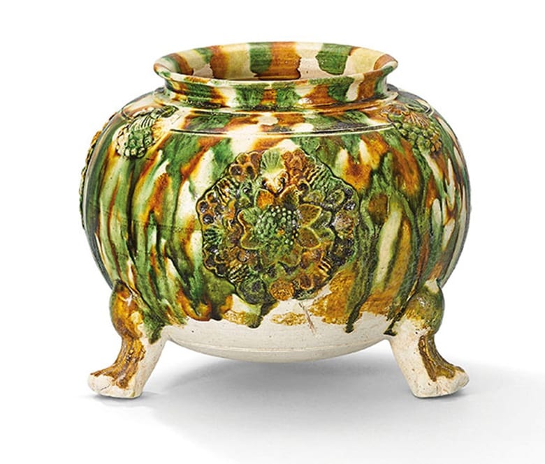 a sancai glazed applique decorated tripod jar